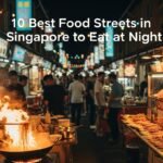 Night street food stalls on a busy food street in Singapore