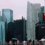 Money exchange Singapore 2026 — best money changers guide covering The Arcade Raffles Place, Lucky Plaza, Mustafa Centre and Parkway Parade with rates, addresses and contact numbers
