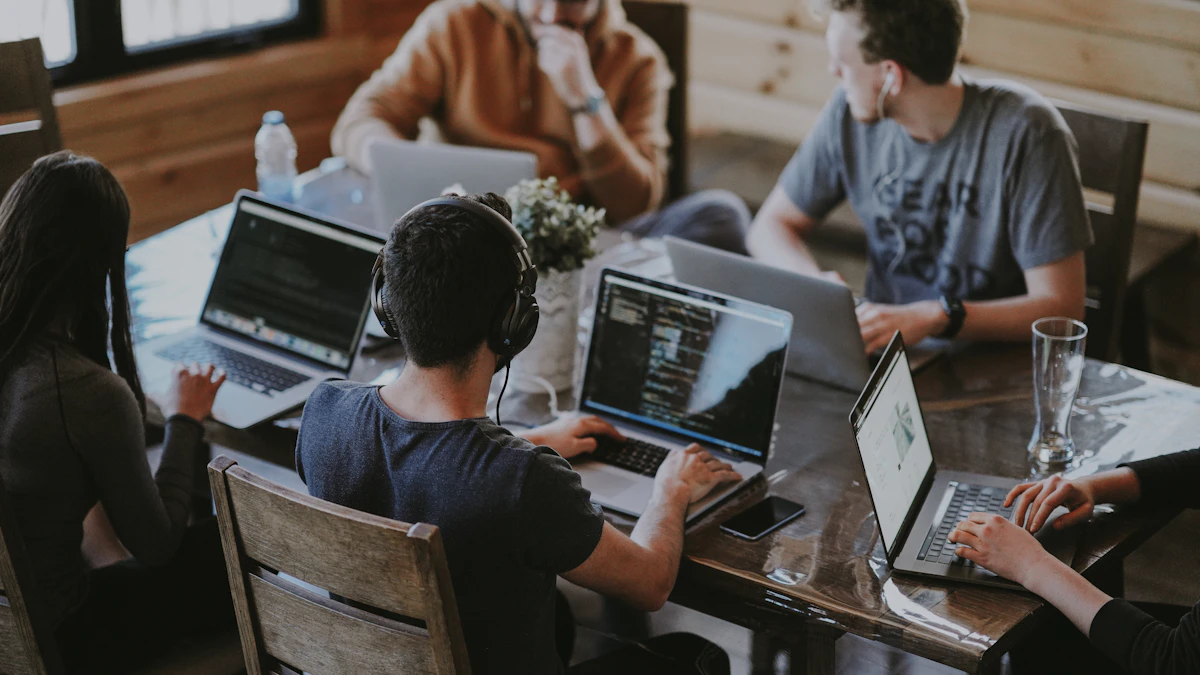 A digital marketing team reviewing AI search strategy on a laptop