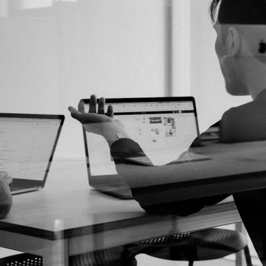 Marketer reviewing a LinkedIn document ad campaign on a laptop